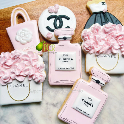 Decorative cookies shaped like Chanel fashion bags, shopping bags,perfume bottles 