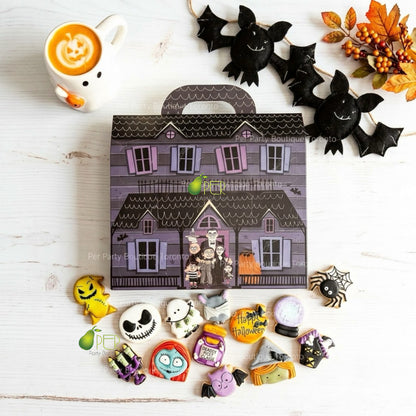 A Halloween-themed advent box with a haunted house illustration  with  12  assorted  mini sugar cookies very beautifully and detailed decorated .